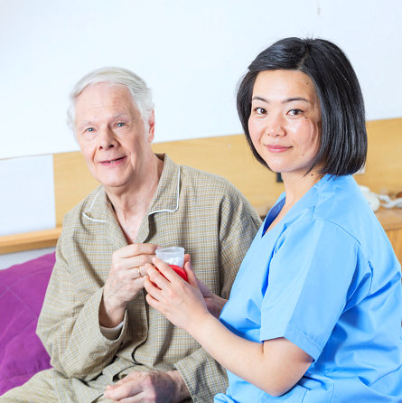 caregiver with her senior patient